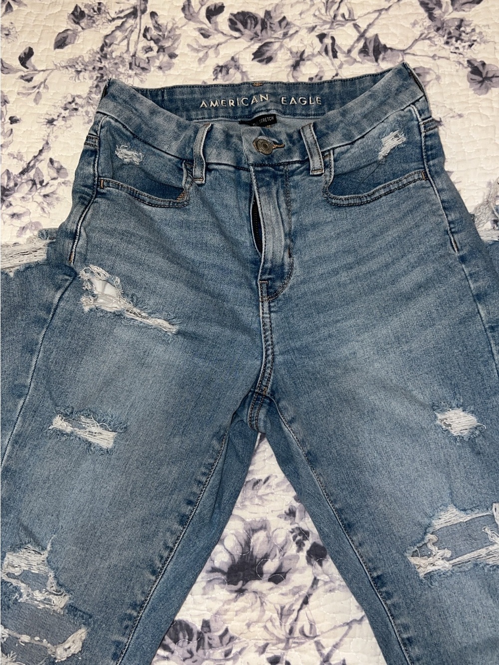 American Eagle Outfitters Light Blue High-Rise Distressed Jeans